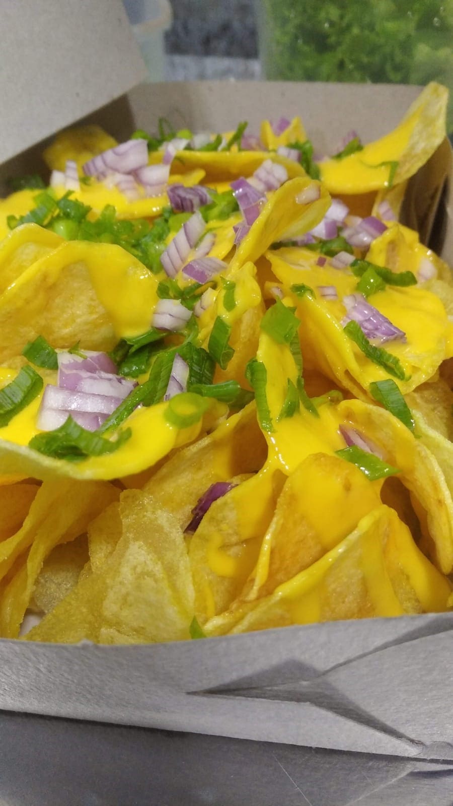 Papas fritas con cheddar